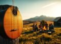 What are the defining features of country music?